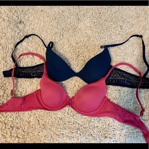 Two VS Pink bras, navy and pink 34A